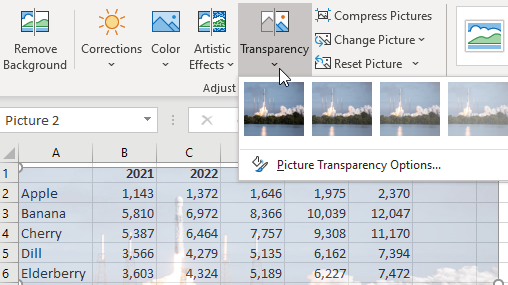 На вкладке 'Работа с рисунками' в ленте появилось меню для изменения прозрачности изображения.