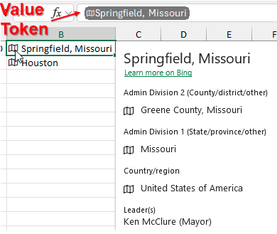 Значок карты появляется слева от Спрингфилд, Миссури в ячейке B1. Строка формул показывает 'Спрингфилд Миссури' с серым фоном, указывая на дополнительные данные. Кликните значок, чтобы увидеть карточку с информацией.